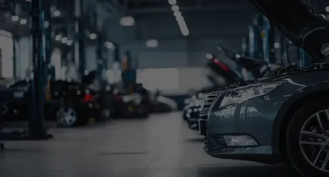 Various cars parked in garage | Auto Brakes & Lube