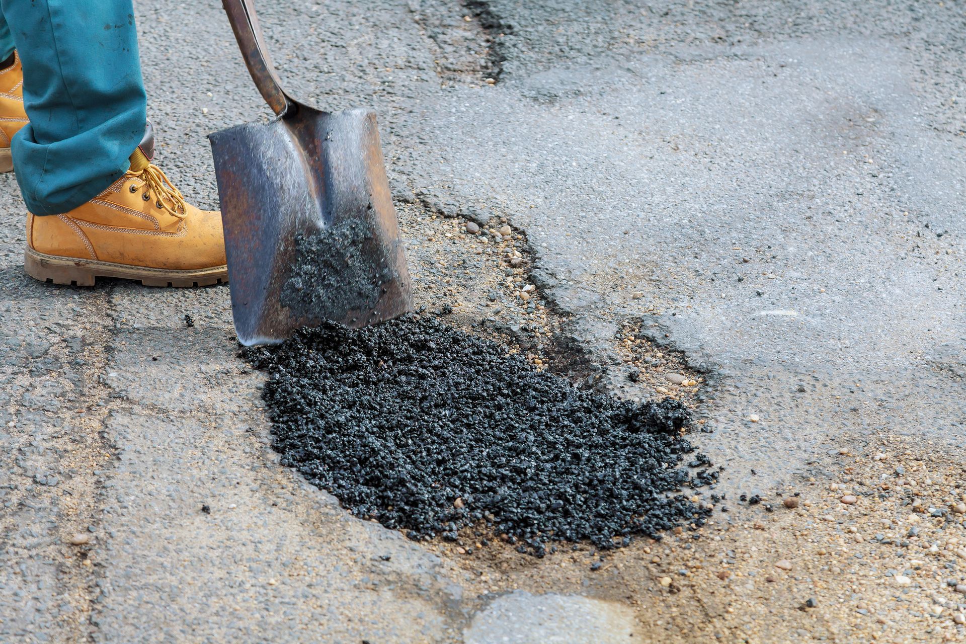 Pothole Repair – Brookfield, MA – Grindstone Sealcoating