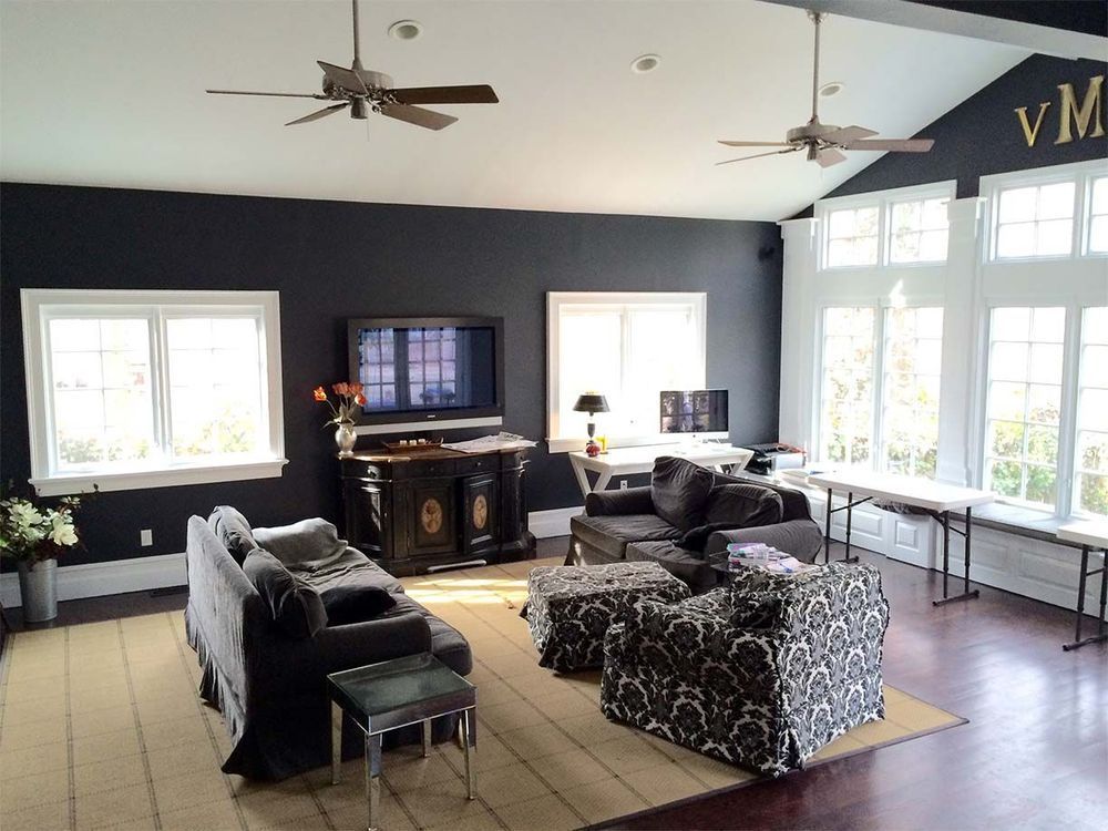 A living room filled with furniture and a flat screen tv