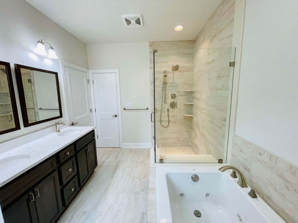 A bathroom with a sink , toilet , and mirror.