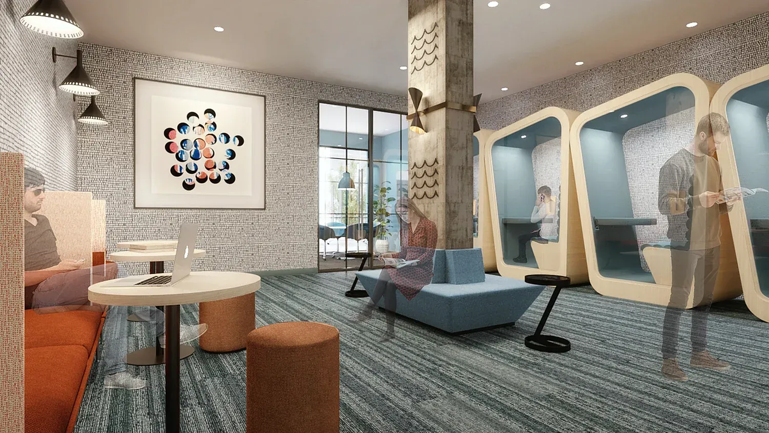 Interior of a modern community lounge with pod seating and people using laptops.