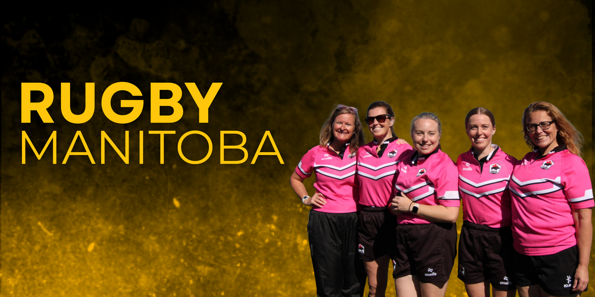 Five people in matching pink rugby jerseys and black shorts stand side-by-side in front of a Rugby Manitoba logo.