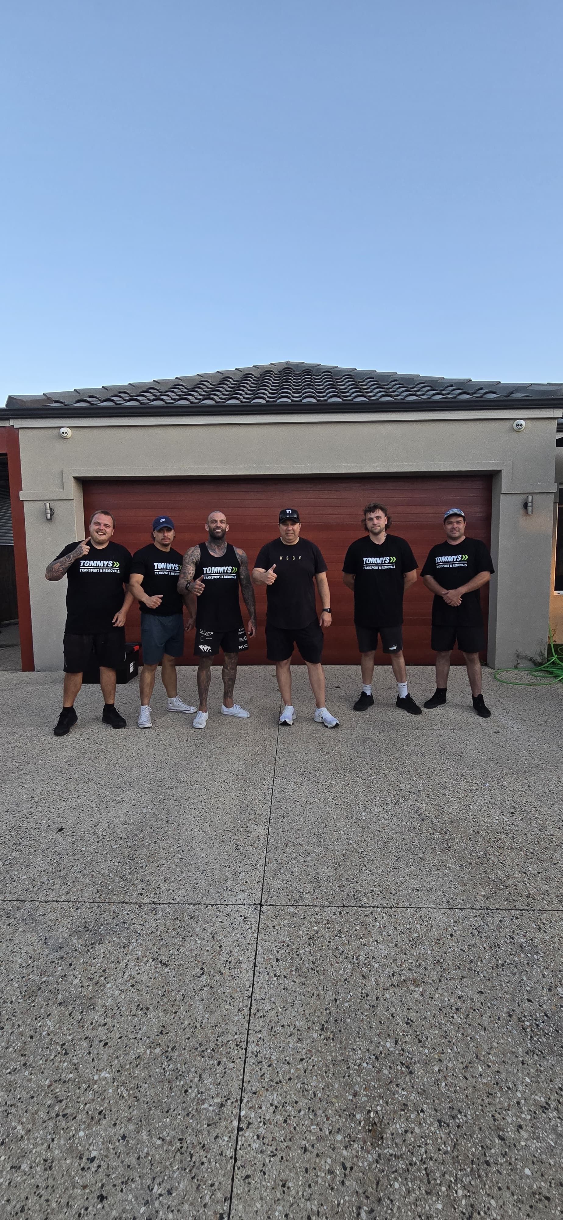 Tommy's Transport and removals team ready to remove furniture from house for clients in Perth