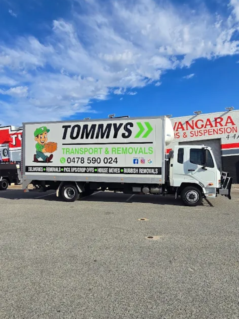 Tommy’s Transport and Removals moving truck with sign writing go logo and business name