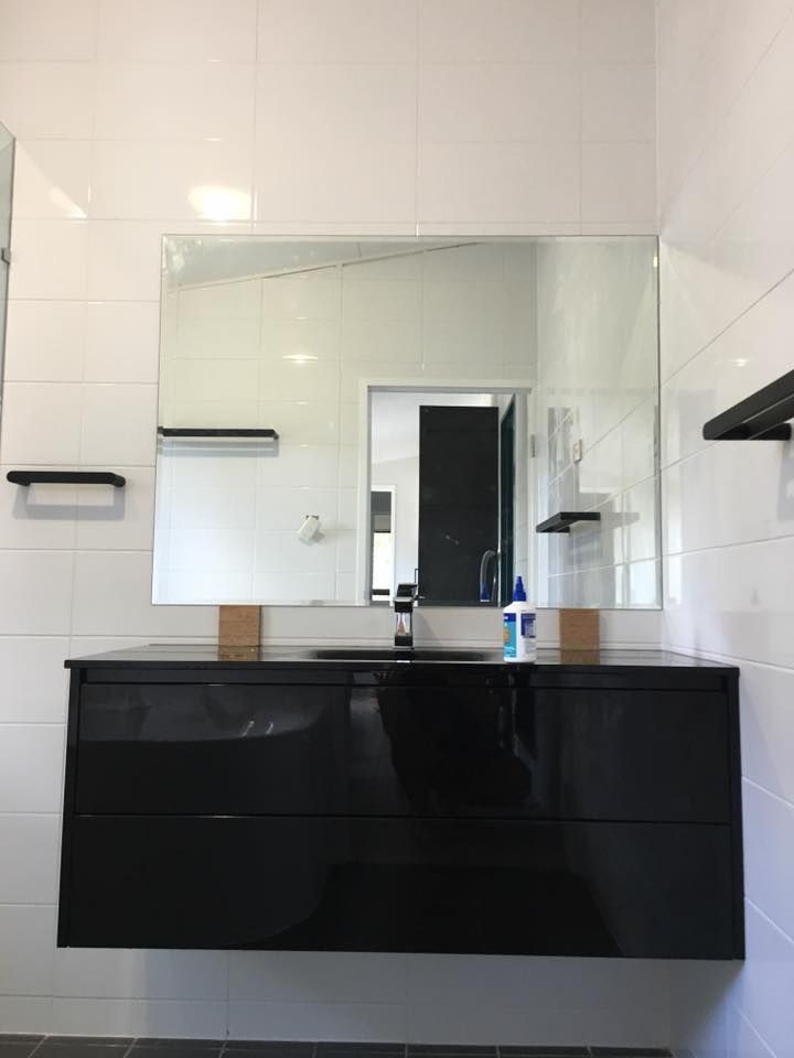 Person in Orange Work Jacket — Langley Plumbing in Mareeba, QLD