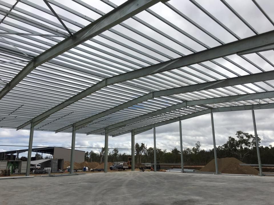 Wooden Stage With Gold Backdrop — Langley Plumbing in Mareeba, QLD