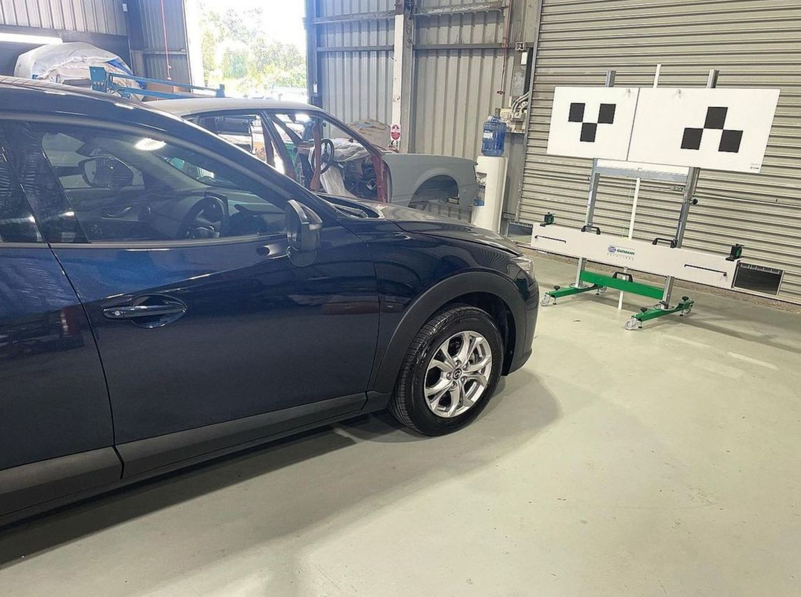 Dak Blue Car Parked in Service Garage — ADAS Services in the Southern Highlands, NSW