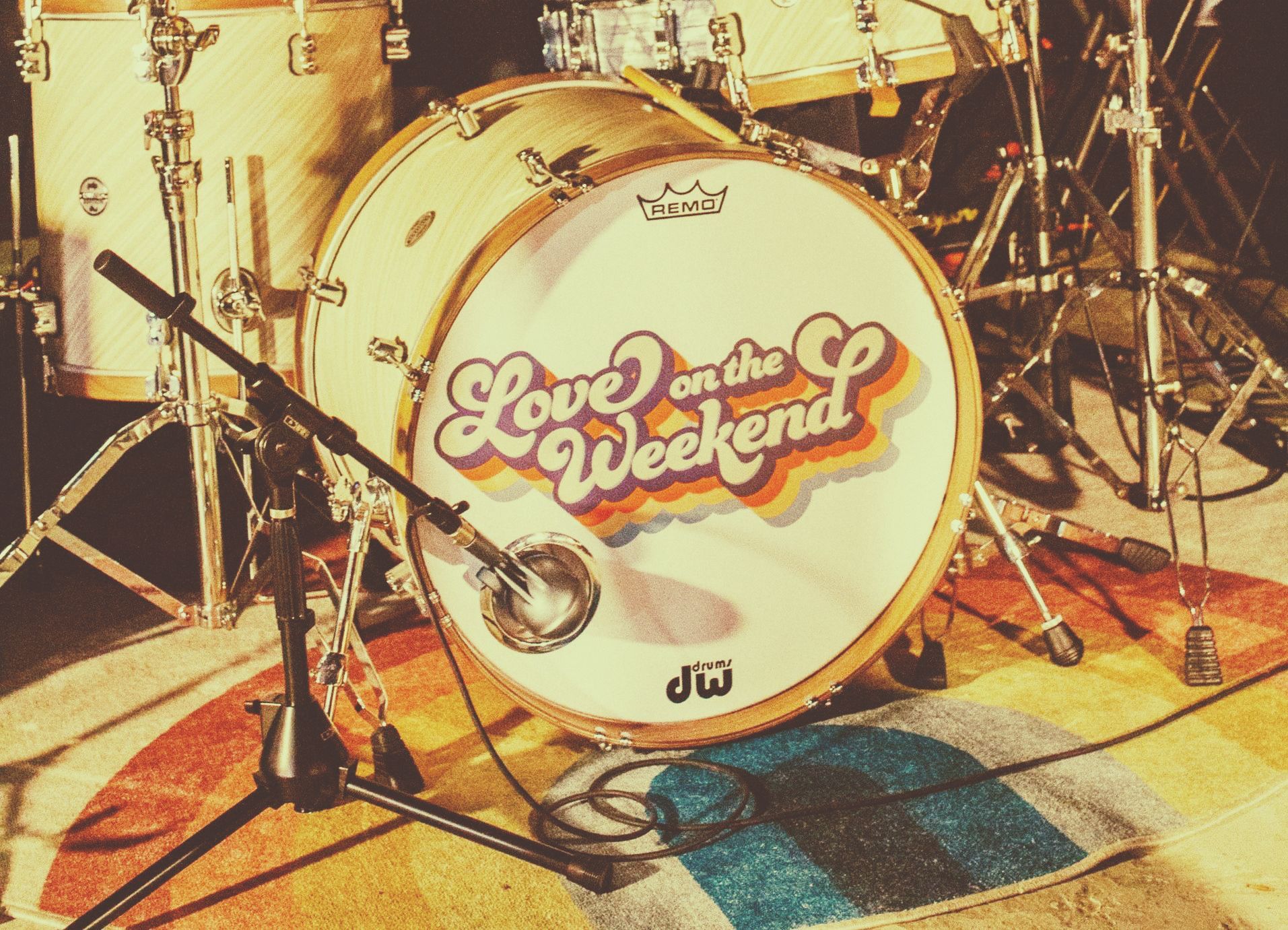 a drum set with the words love on the weekend on it
