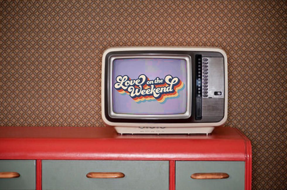 an old television is sitting on top of a red dresser.