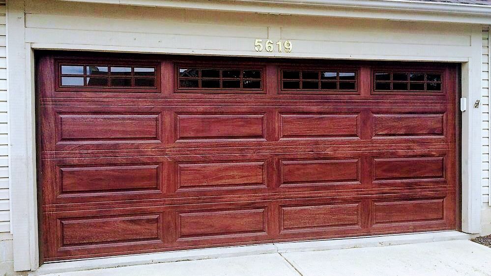 A wooden garage door with the number 88 on it