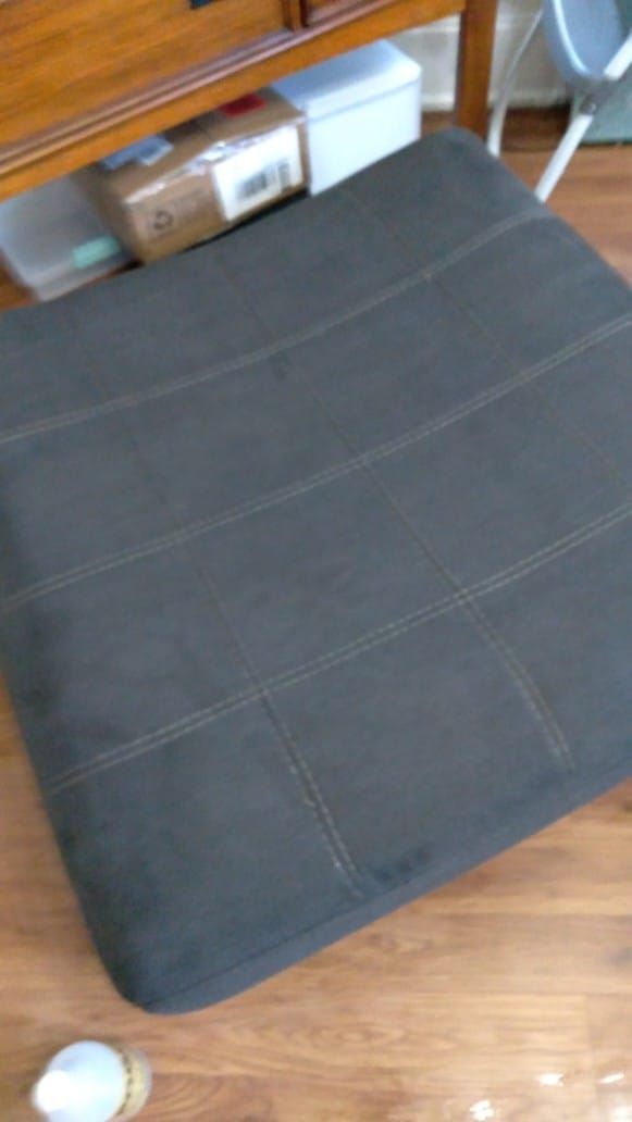 a black ottoman is sitting in St. Louis, Missouri