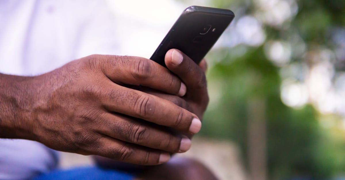 Man using wifi with mobile phone