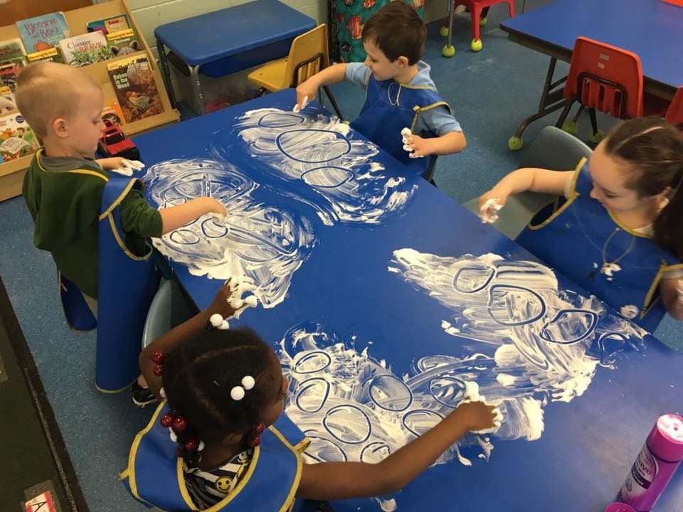 Toddler enjoying indoor playtime at child care facility