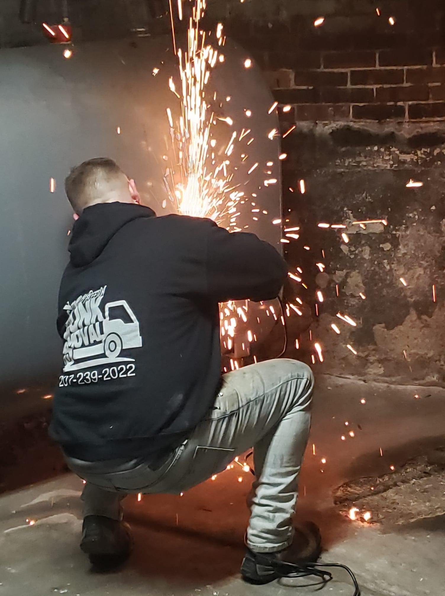 cutting a big boiler tank for removal