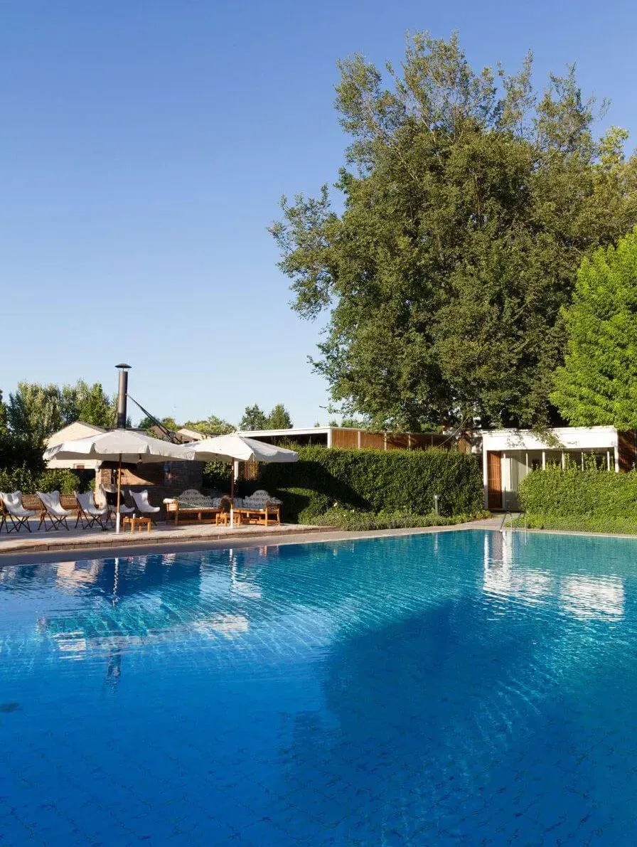 image of an in-ground pool on a clear day
