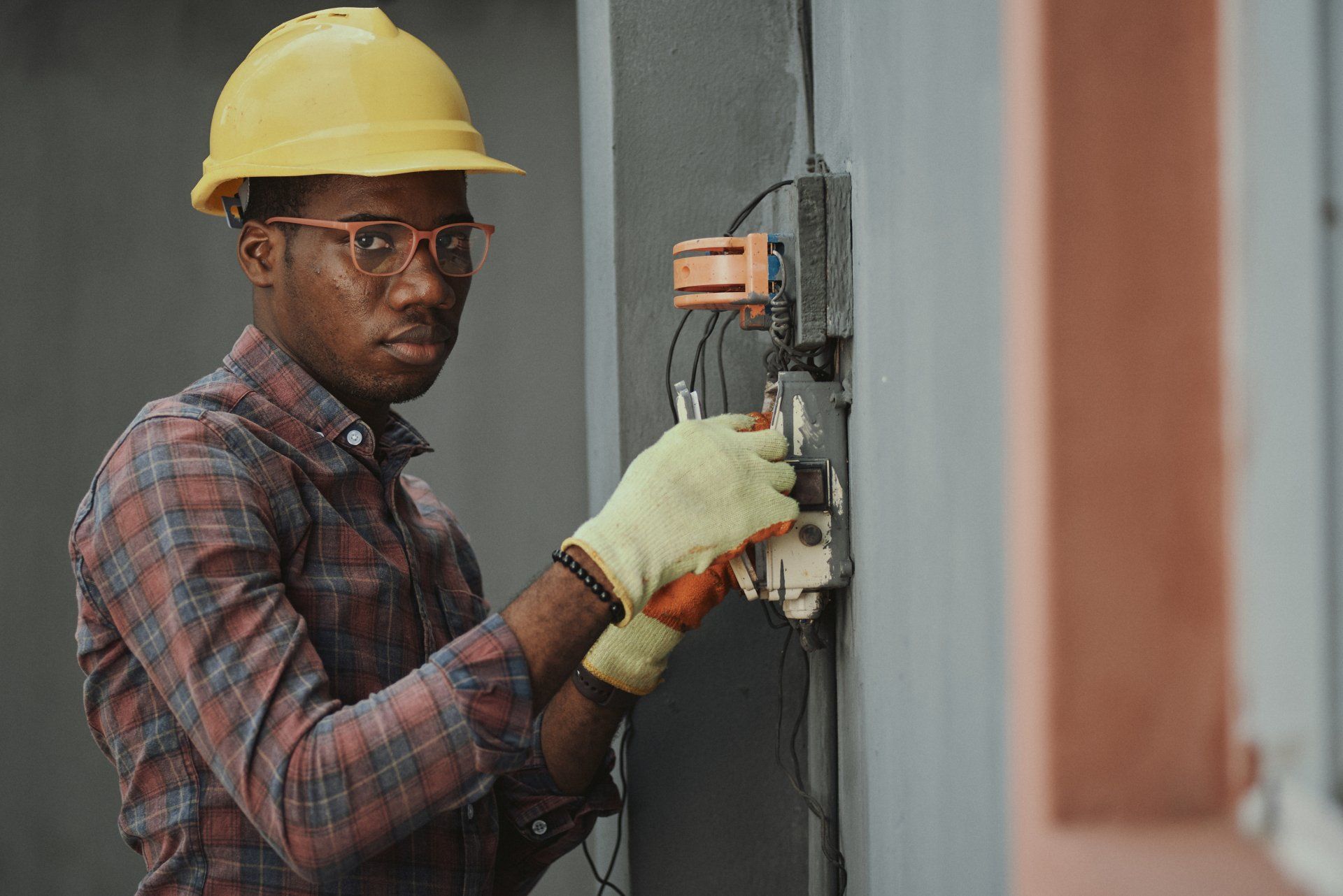 Electrician with a Yellow Safety Hat