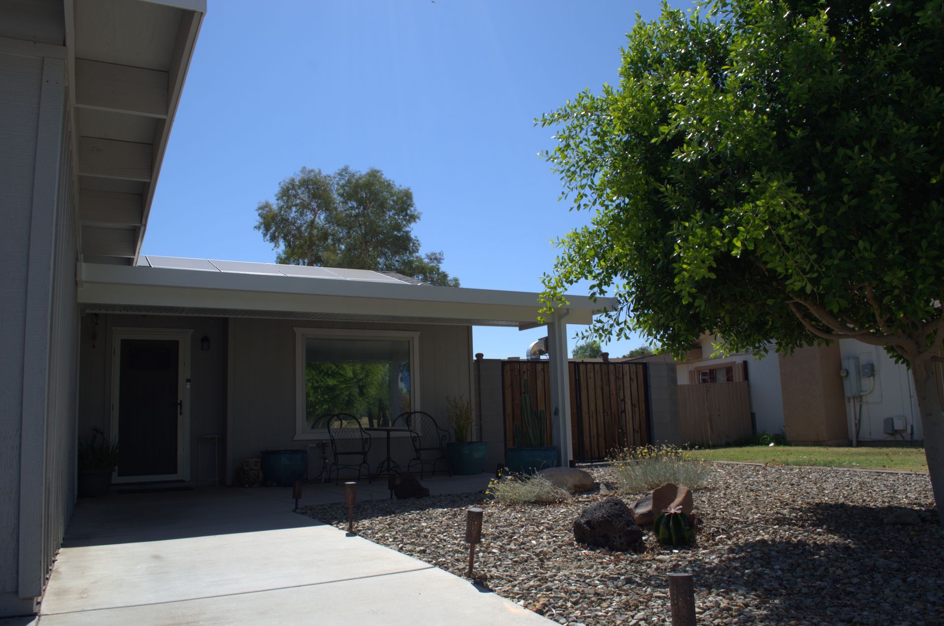 Luxurious sunroom addition featuring aluminum awnings in Tempe.