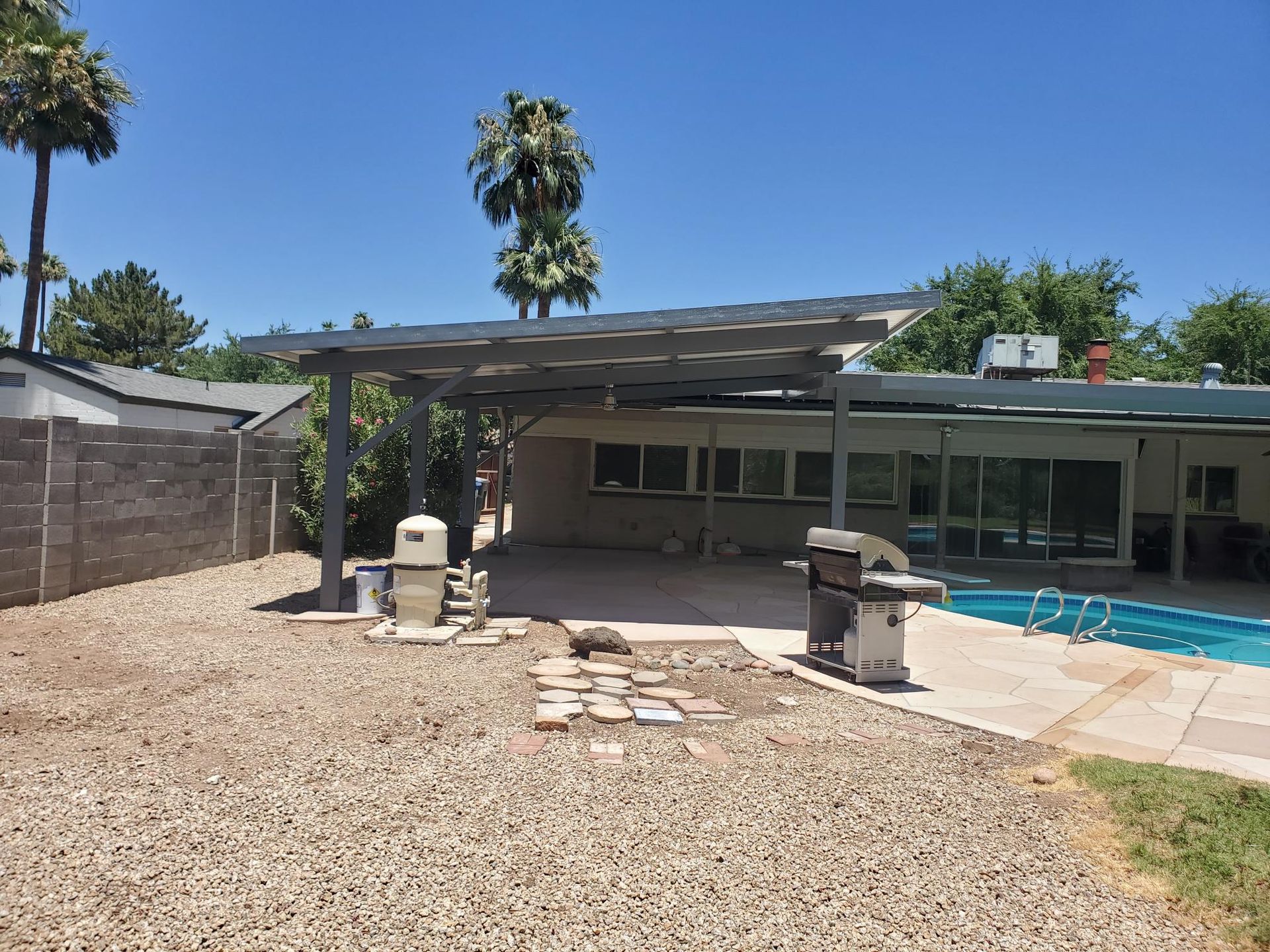 Spacious sunroom with aluminum patio covers in New River.
