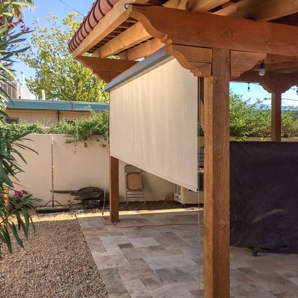 Custom-designed patio cover by Southwest Patio, providing stylish shade in a vibrant Phoenix backyard.