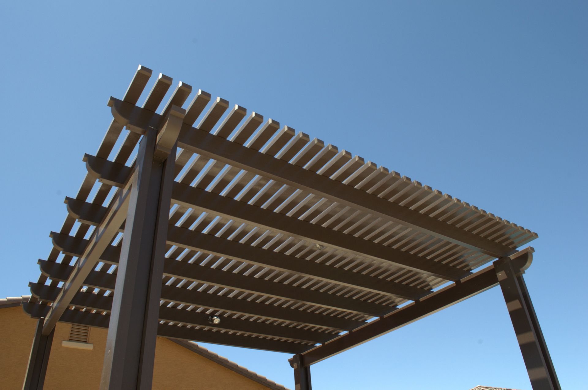 Beautiful Mesa home enhanced with a custom patio cover by Southwest Patio, blending seamlessly with Arizona's landscape.