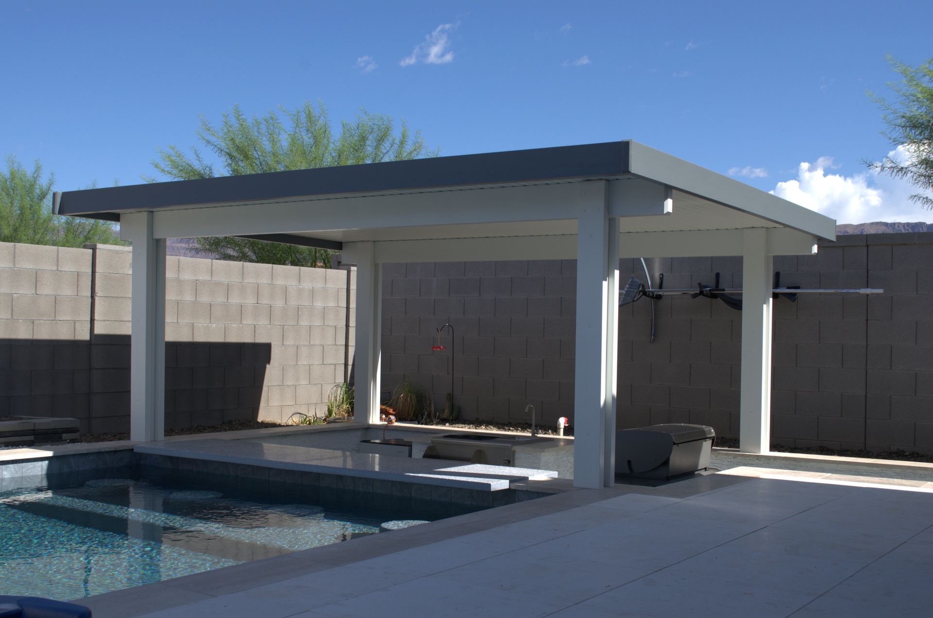 Beautiful Mesa home enhanced with a custom patio cover by Southwest Patio, blending seamlessly with Arizona's landscape.