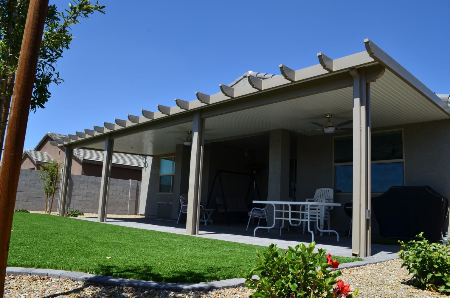 Beautiful Mesa home enhanced with a custom patio cover by Southwest Patio, blending seamlessly with Arizona's landscape.