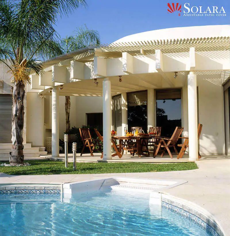 Elegant Solara Patio Cover with adjustable louvers for perfect outdoor ambiance.
