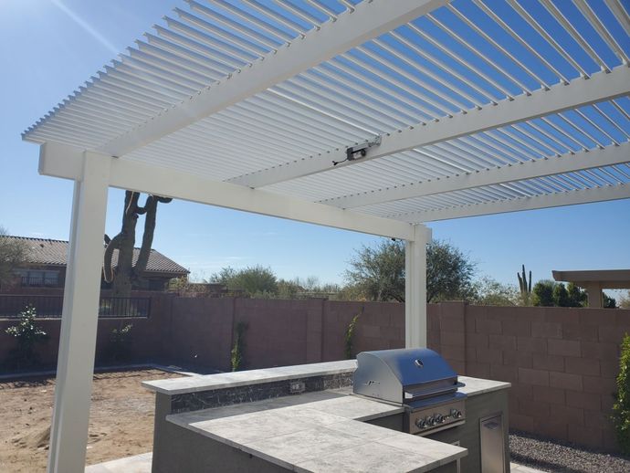 Elegant outdoor dining area in Mesa, AZ, enhanced by Southwest Patio's custom pergola.