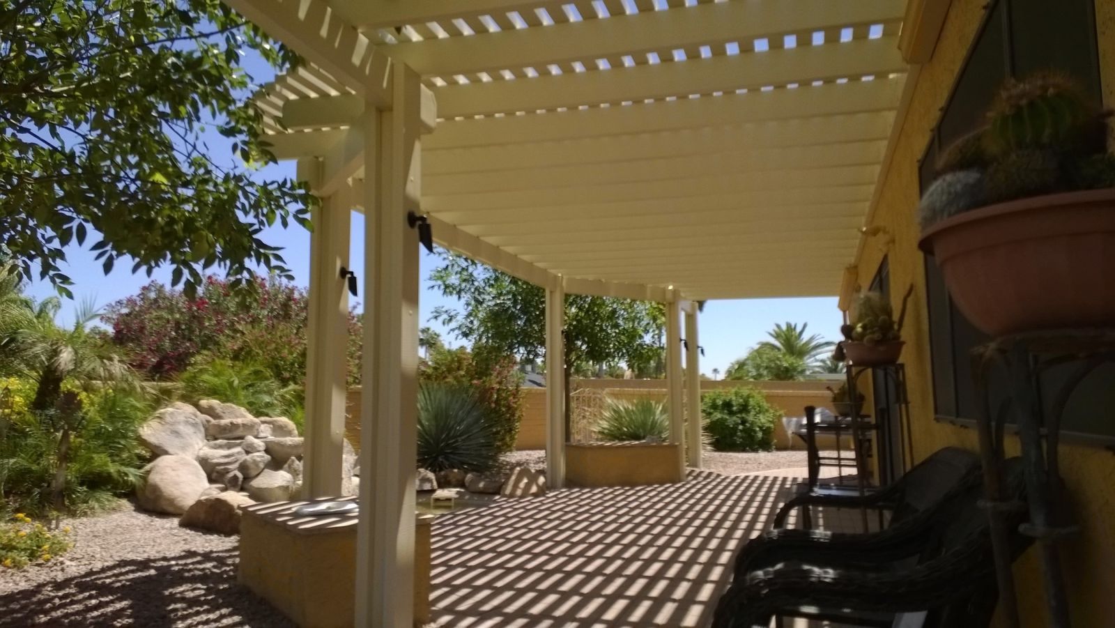 Paradise Valley estate showcasing a luxurious open-style lattice cover, elevating outdoor elegance with Southwest Patio.