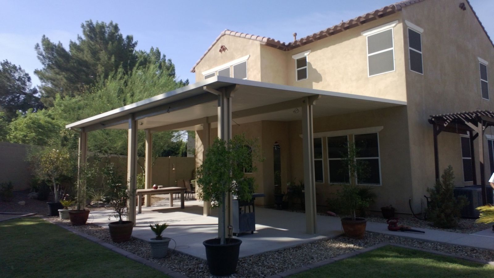 Custom-crafted Insulated Patio Cover by Southwest Patio, merging luxury with functionality.