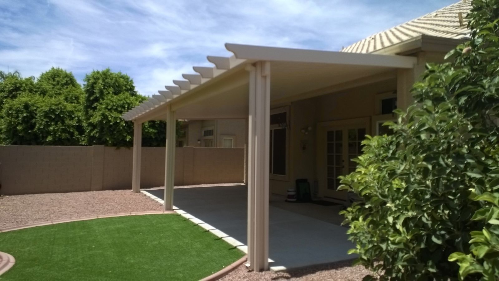 Tempe's vibrant homes accented with elegant Flat Pan Patio Covers, designed for Arizona's sunny climate.