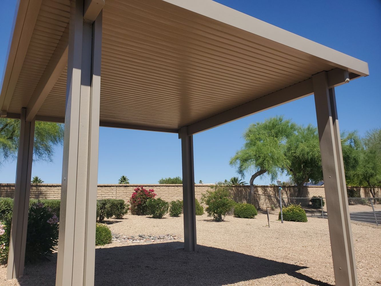 Casa Grande homes boast Southwest Patio Flat Pan Covers, combining practicality with southwestern flair.
