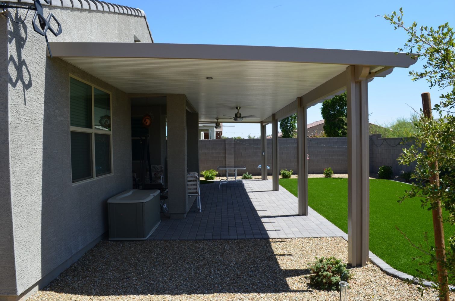 Chic Flat Pan Patio Cover installation in Chandler, blending seamlessly with modern home aesthetics.