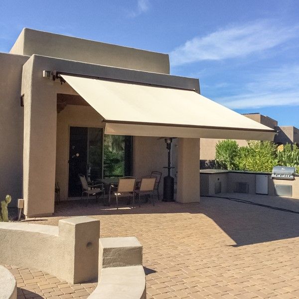 Innovative design of a gabled roof cover by Southwest Patio, offering year-round protection in Surprise, AZ.