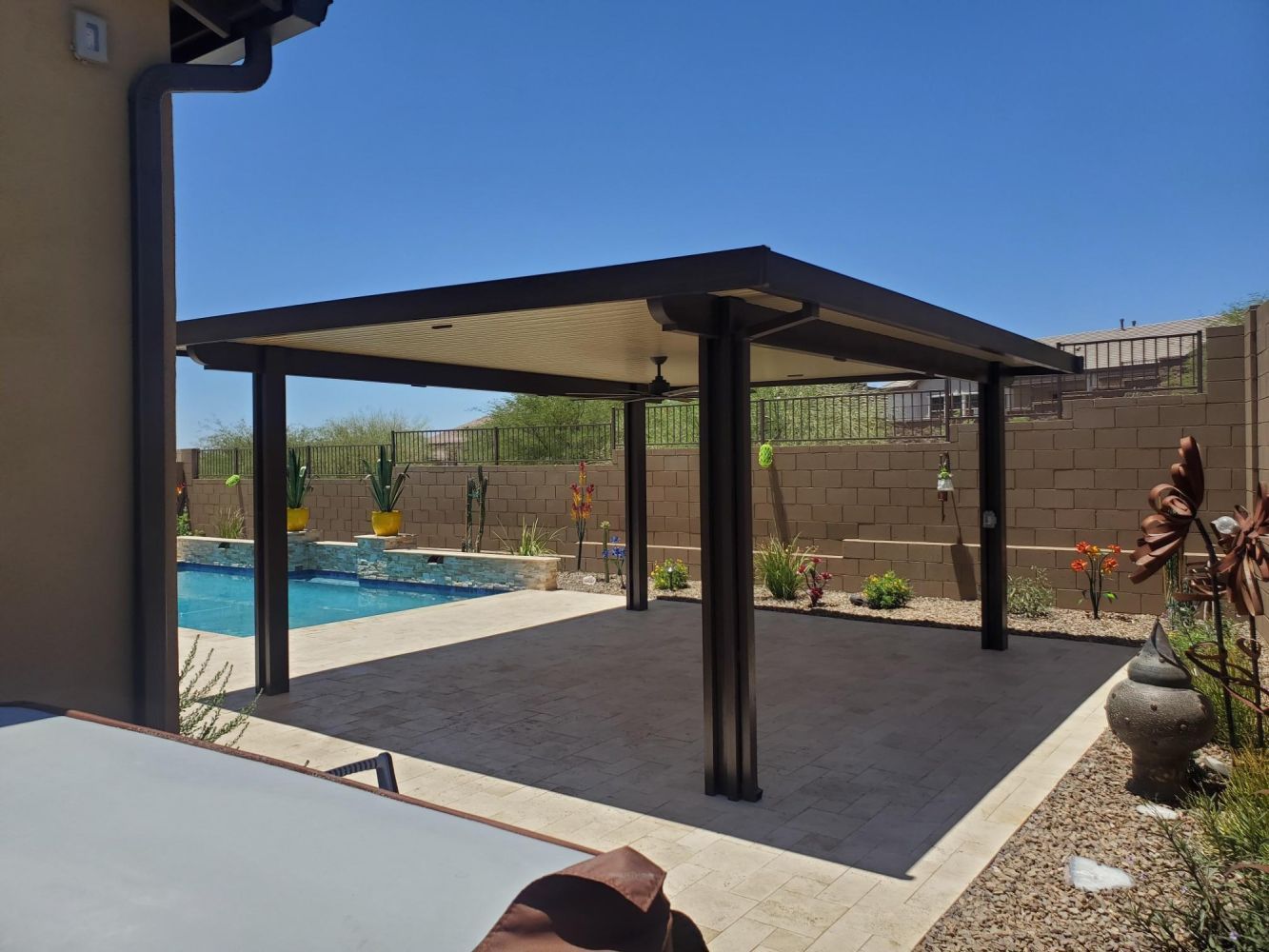 Beautiful Mesa home enhanced with a custom patio cover by Southwest Patio, blending seamlessly with Arizona's landscape.