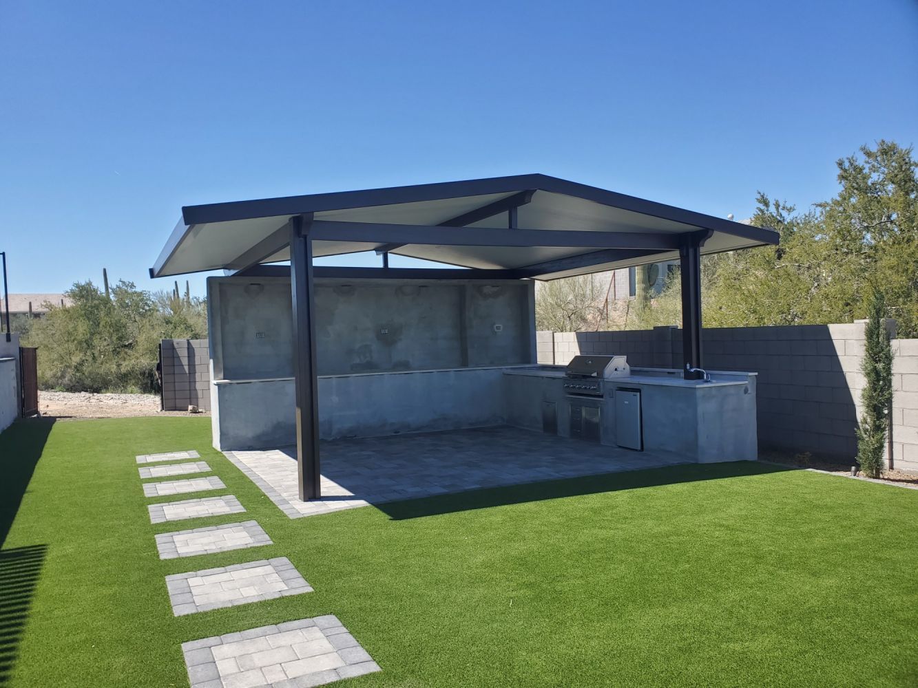 Beautiful Mesa home enhanced with a custom patio cover by Southwest Patio, blending seamlessly with Arizona's landscape.