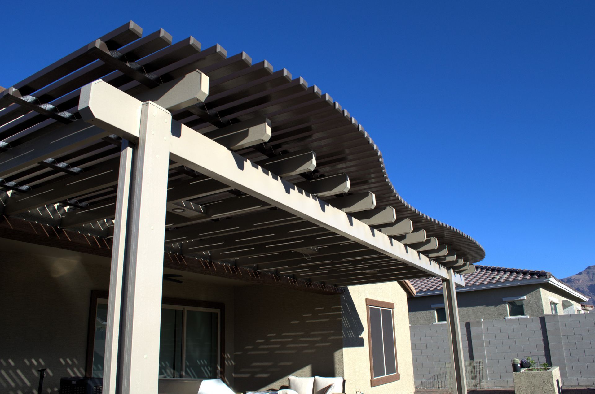 Custom-designed alumawood lattice patio cover in Paradise Valley, crafted for elegance by Southwest Patio.