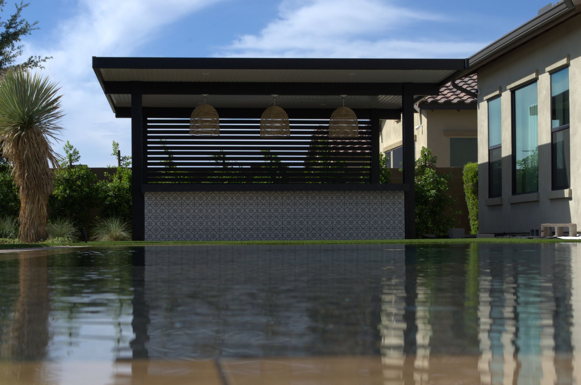 Beautiful Mesa home enhanced with a custom patio cover by Southwest Patio, blending seamlessly with Arizona's landscape.