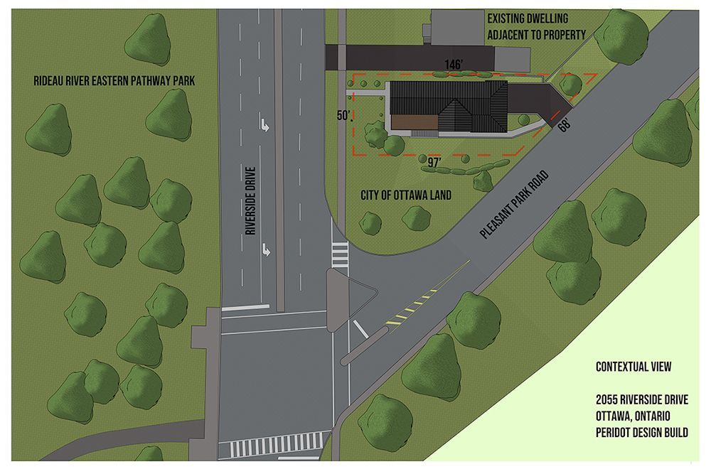 An aerial view of a city with trees and roads