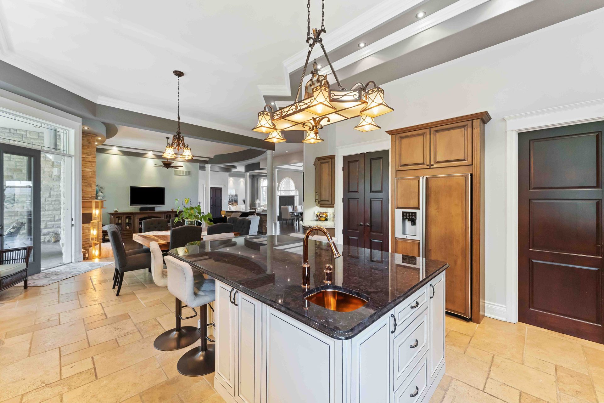 There is a large island in the middle of the kitchen.
