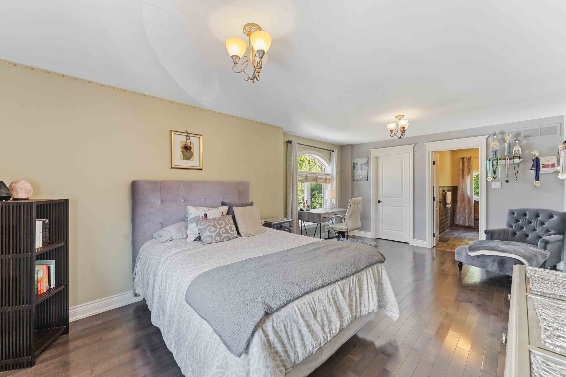 There is a large bed in the middle of the room.