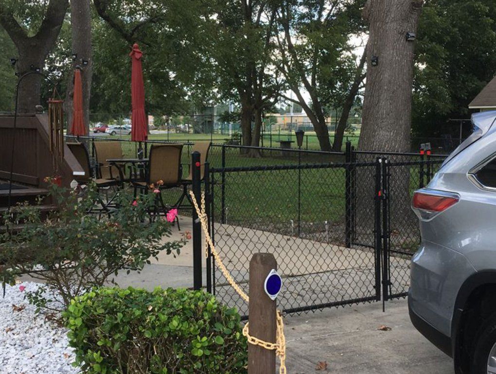 Chain Link Black Vinyl Coated Fence — Elizabeth, NC — Albemarle Fence & Rail, Co.