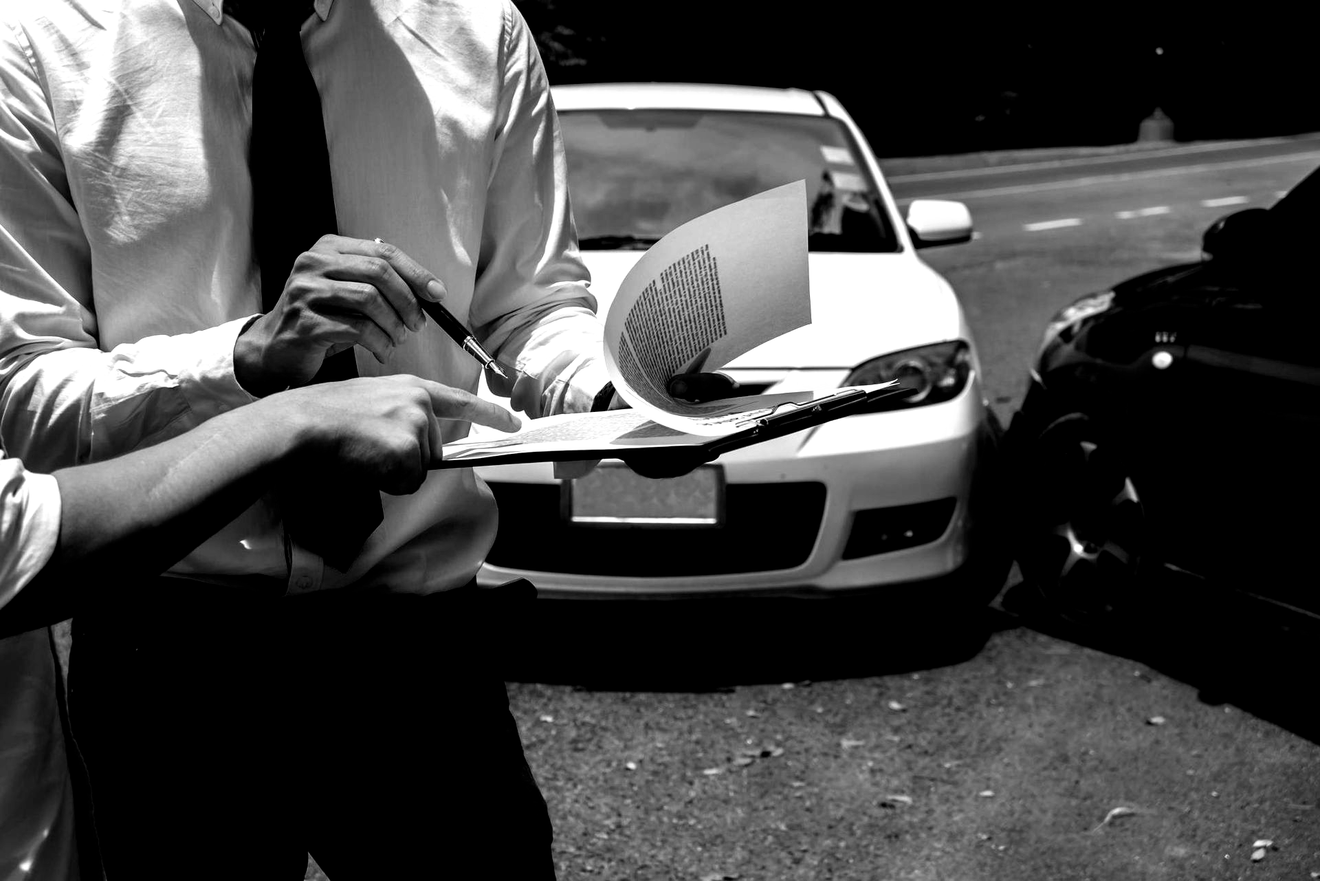 Breaking ocean wave, white foam against teal and dark blue water.