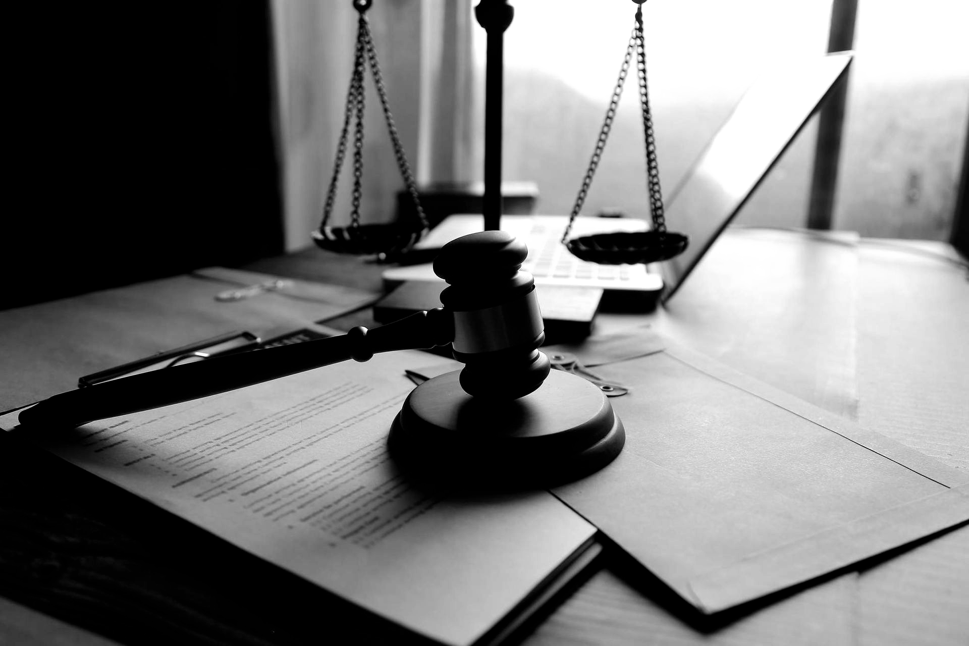 Breaking ocean wave, white foam against teal and dark blue water.