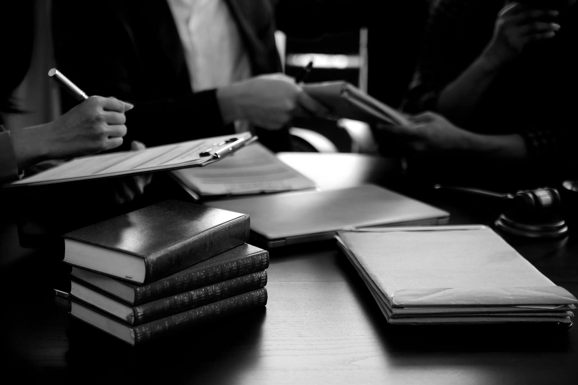 Breaking ocean wave, white foam against teal and dark blue water.
