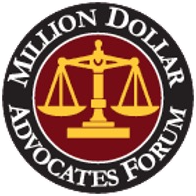 Logo for the Million Dollar Advocates Forum, featuring golden scales of justice within a burgundy circle, surrounded by text.