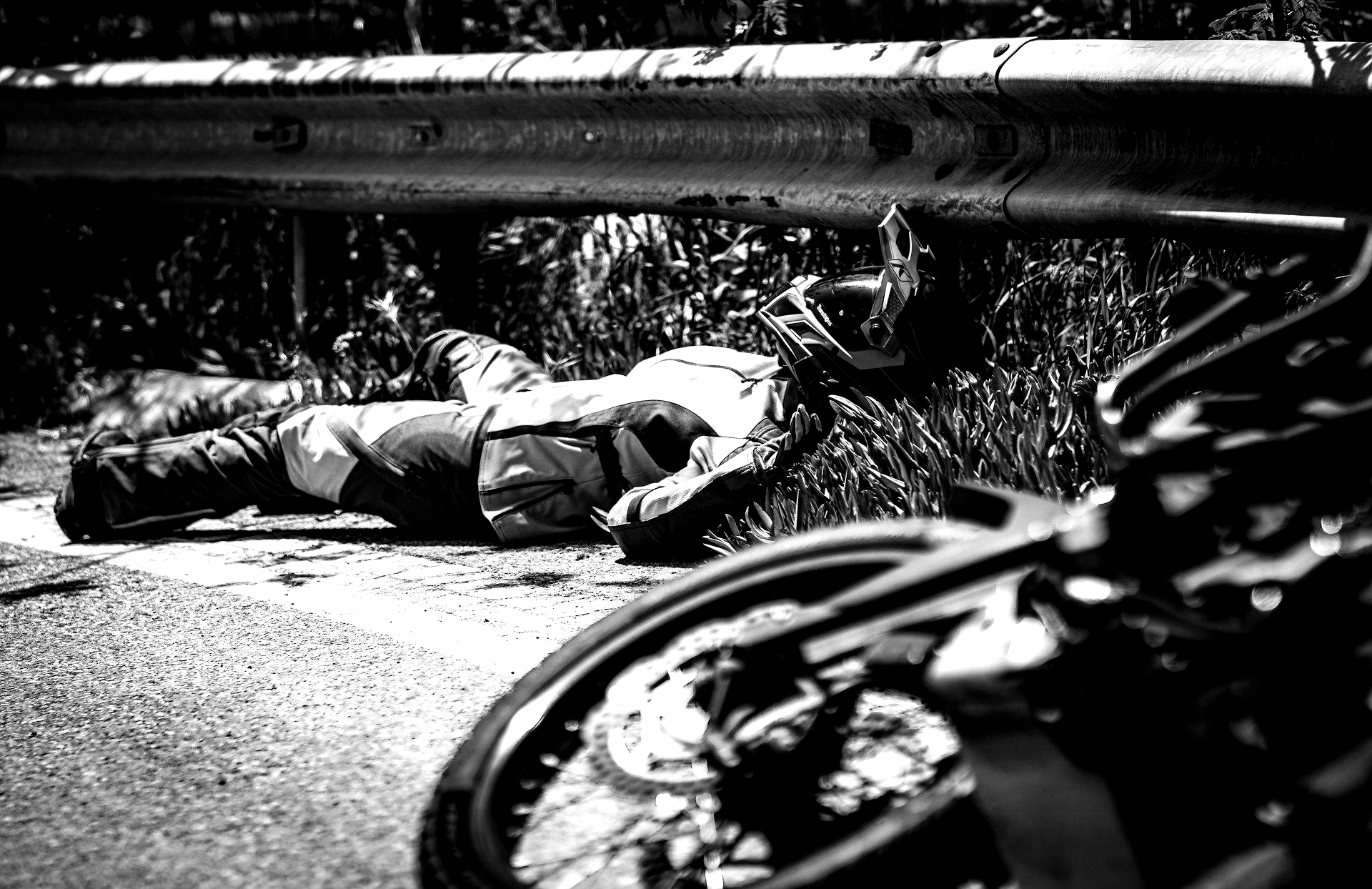 Breaking ocean wave, white foam against teal and dark blue water.