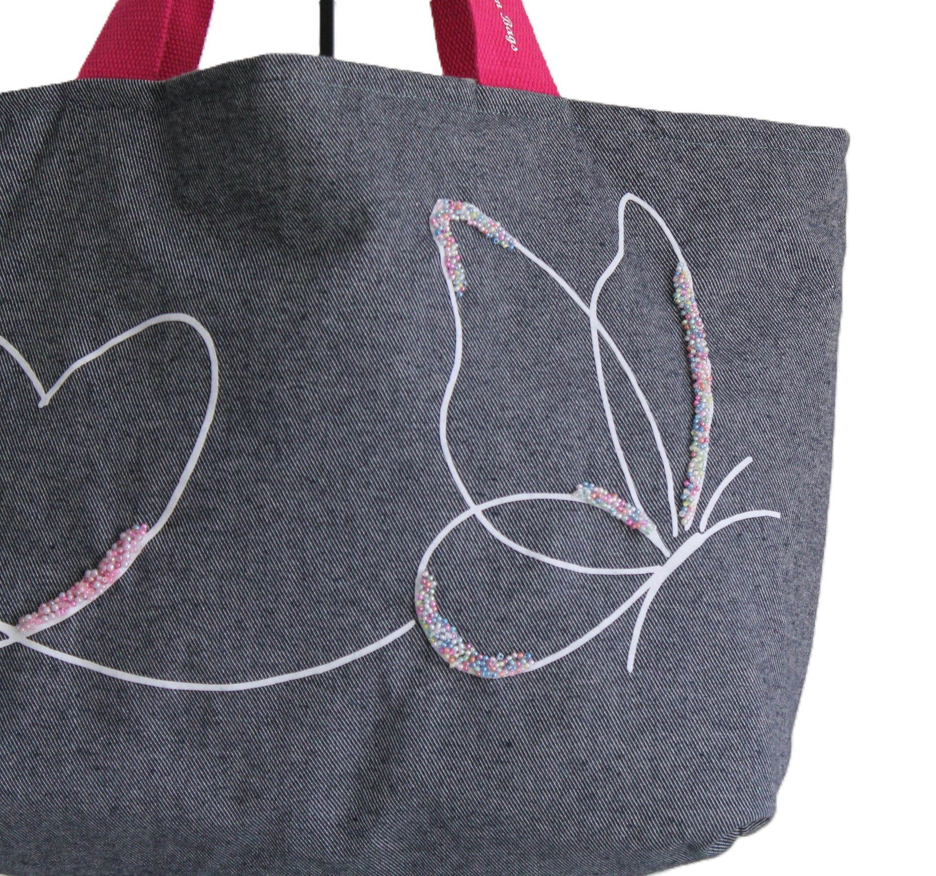 jeanstas met vlinders