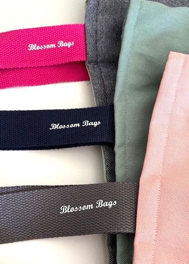 Drie Blossom Bags zijn op elkaar gestapeld