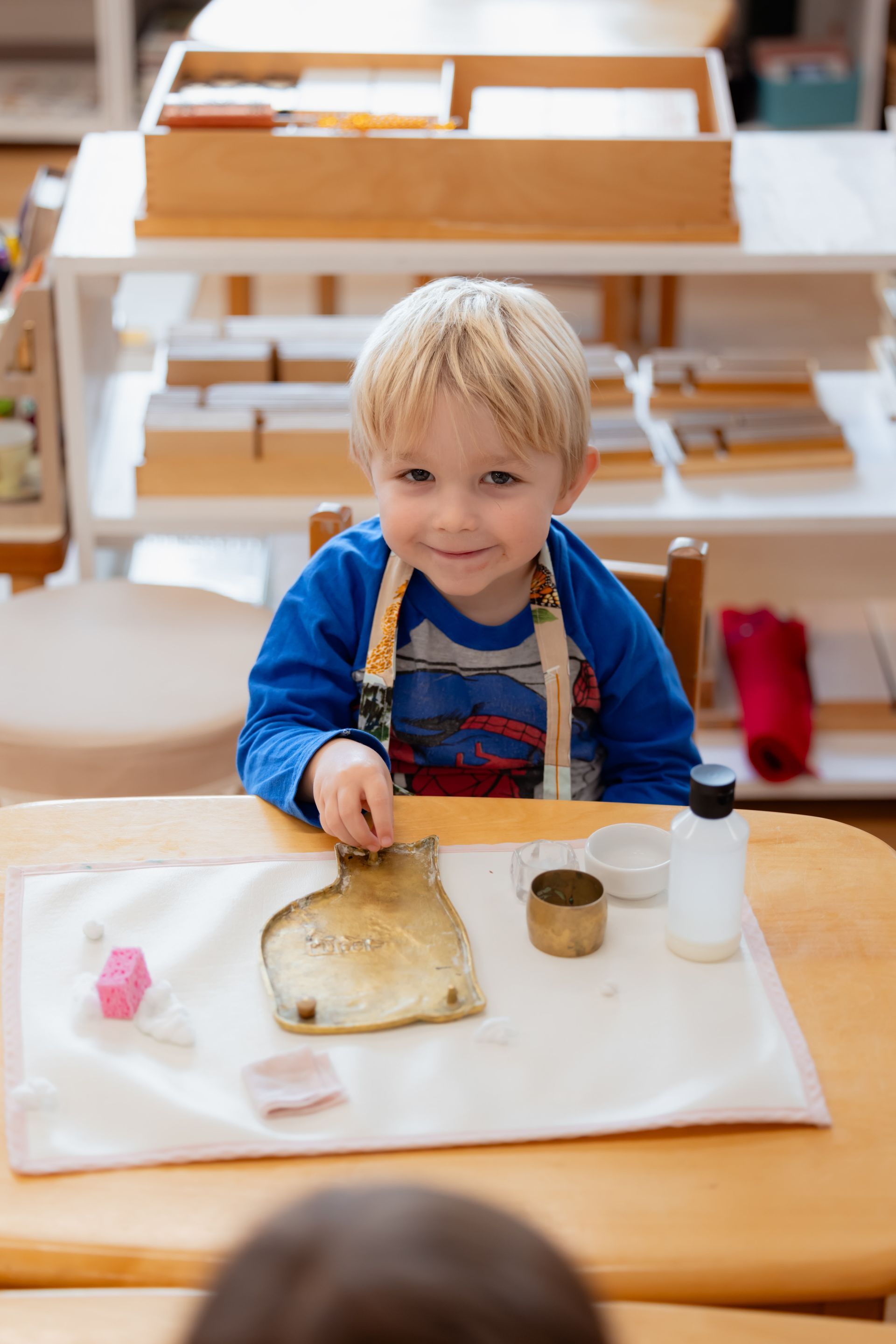 montessori toddler working in the classroom
